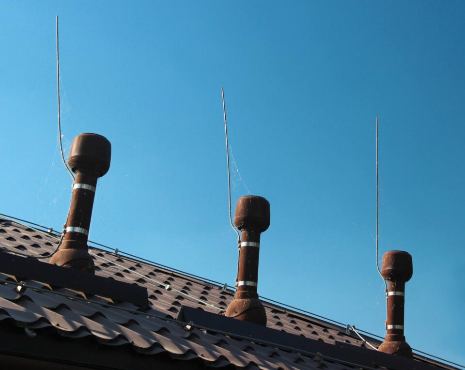 Lightning rods installed on residential chimneys in Dedham, MA