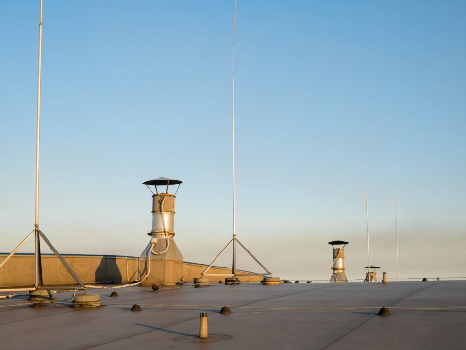 Lightning Rod Installed Beside Rooftop Ventilation Unit on Commercial Building in Dedham, MA