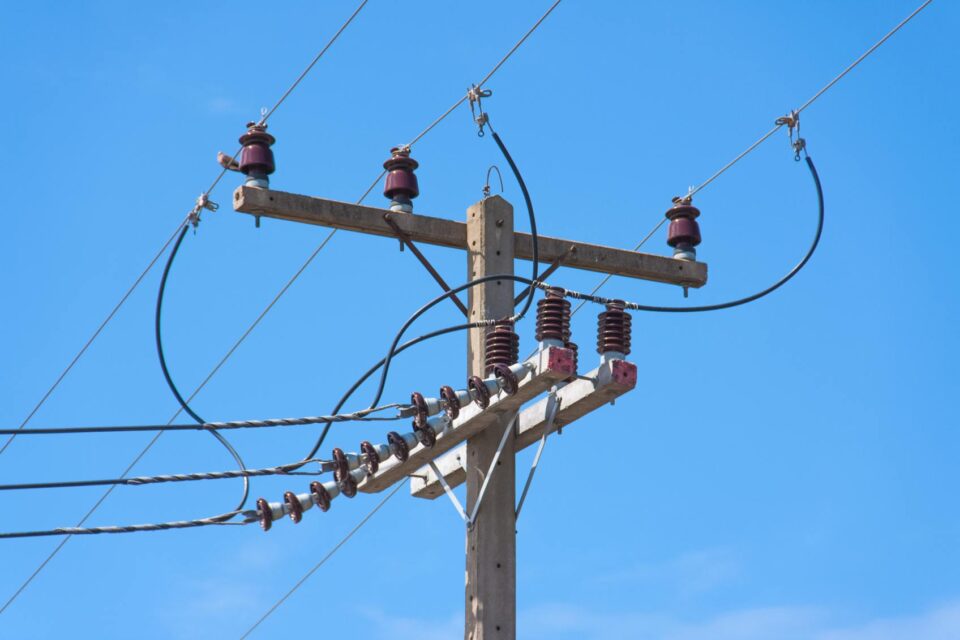 Utility Pole with Top Shield Wire for Lightning Protection in Dedham, MA