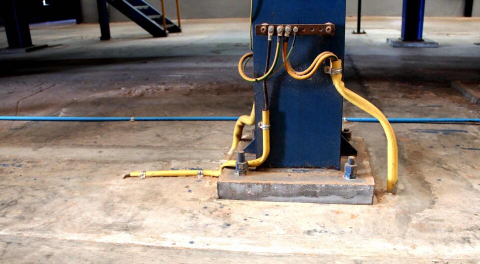 Boston Lightning Rod Co. secures industrial grounding wires to steel column for safety