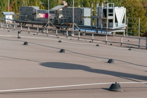 Lightning protection rods installed on industrial roof Dedham MA